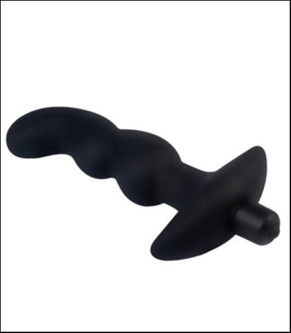 Zakrivljeni analni vibrator